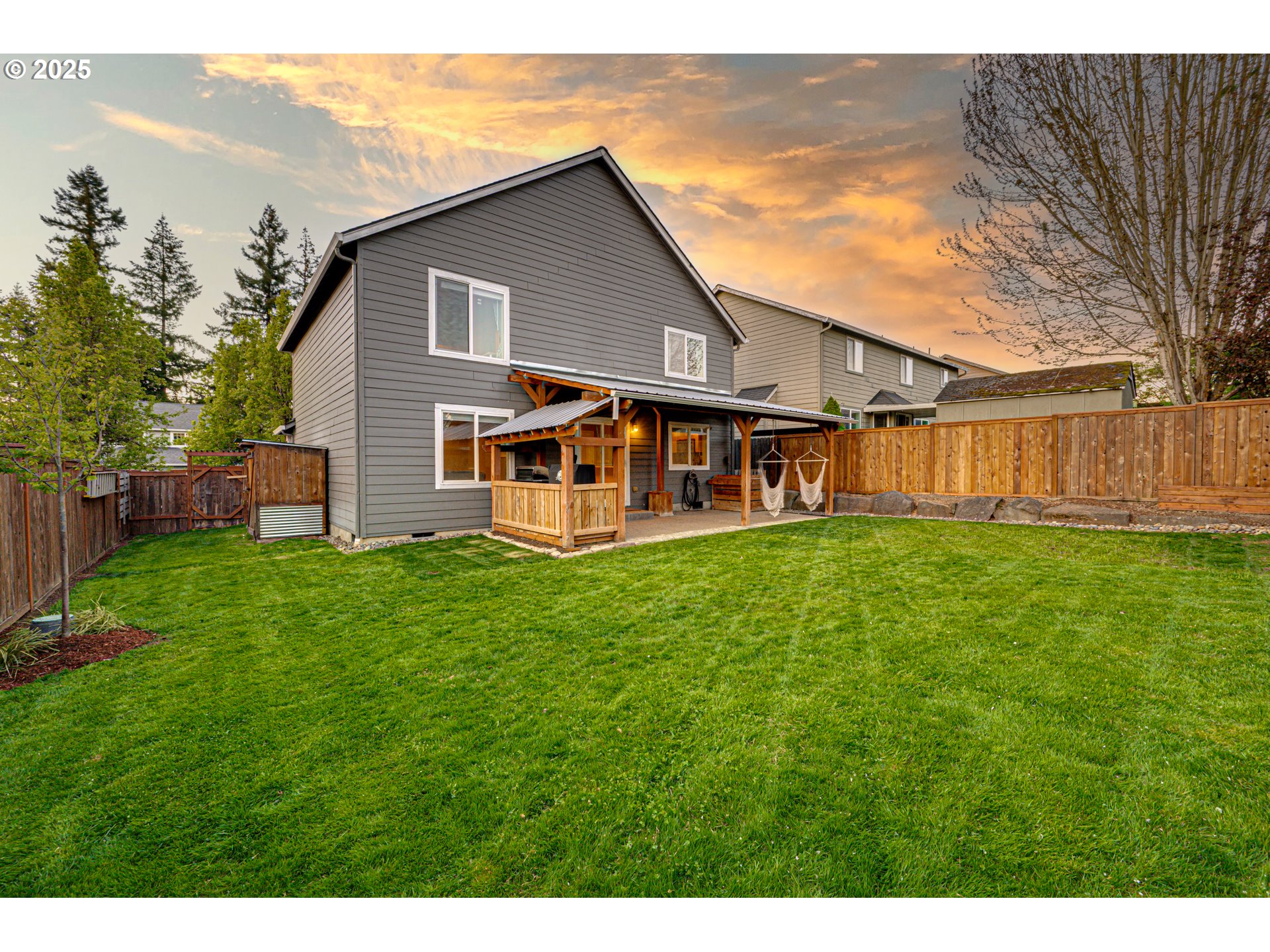 1825 North 9th Way Ridgefield, WA 98642 - Photo 23 of 30 a view of a house with a yard and sitting area