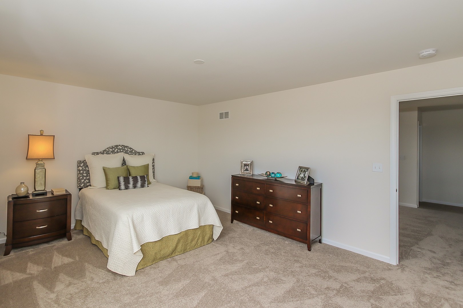 440 Radcliff Lane South Elgin, IL 60177 - Photo 27 of 31 a bedroom with a bed and lamp
