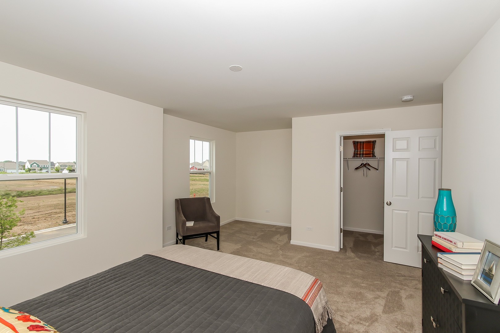 440 Radcliff Lane South Elgin, IL 60177 - Photo 31 of 31 a bedroom with a bed and wooden floor