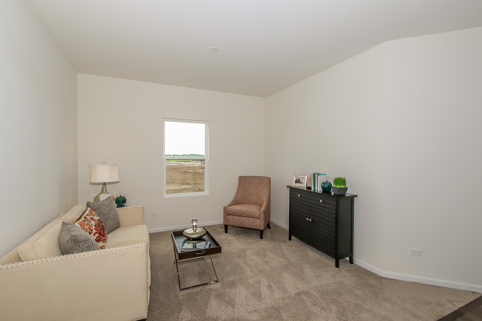 440 Radcliff Lane South Elgin, IL 60177 - Photo 7 of 31 a living room with furniture and a window