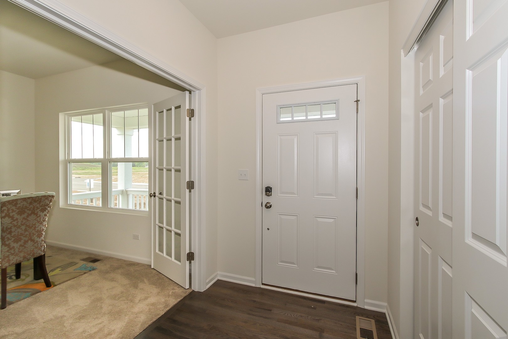 440 Radcliff Lane South Elgin, IL 60177 - Photo 8 of 31 a view of an empty room with wooden floor and a window