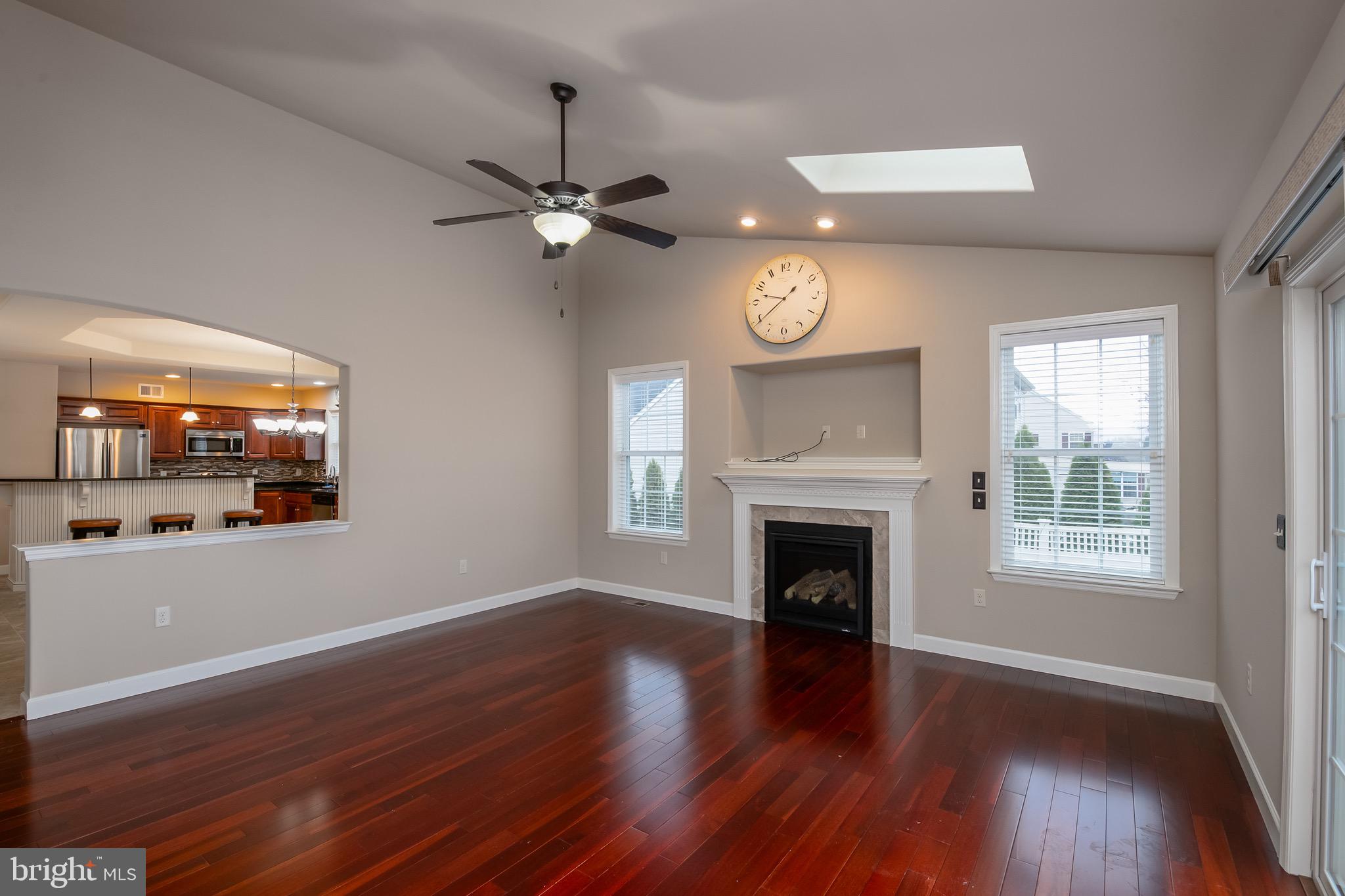654 Ebersole Road Reading, PA 19605 - Photo 12 of 27 a view of an empty room with wooden floor and a window