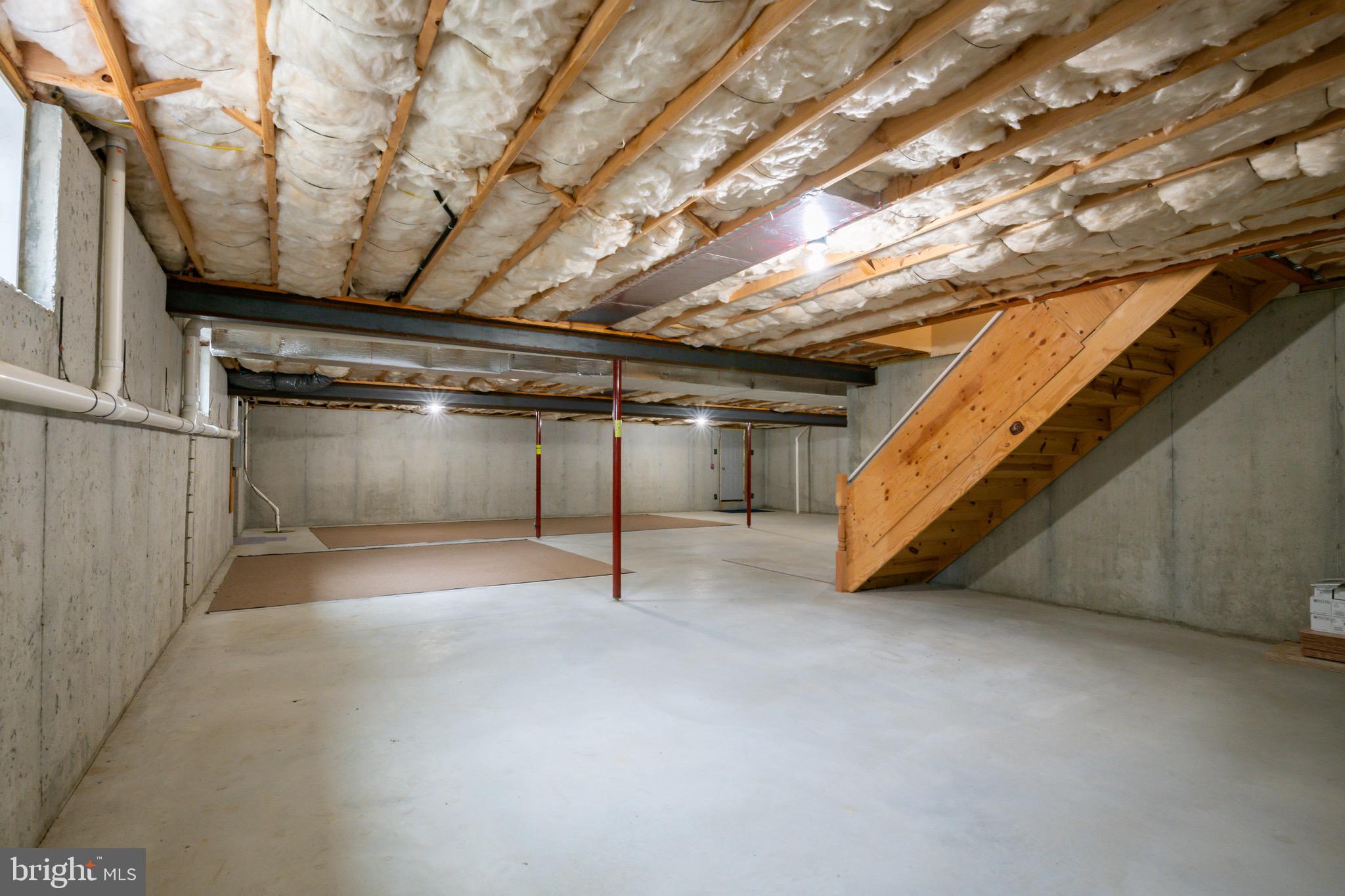 654 Ebersole Road Reading, PA 19605 - Photo 21 of 27 a view of an empty room with a staircase