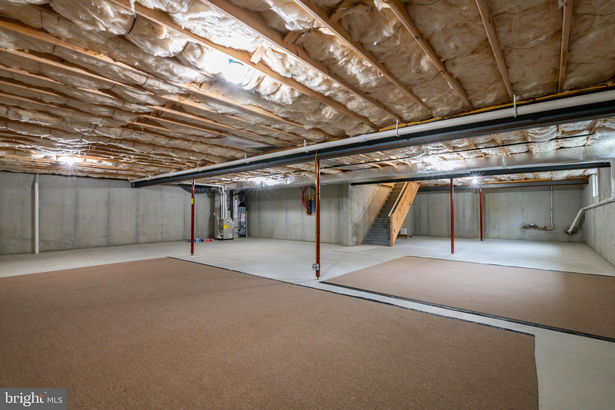 654 Ebersole Road Reading, PA 19605 - Photo 22 of 27 a view of an empty room with a garage