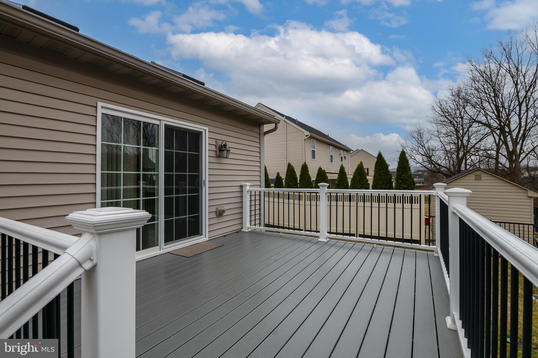 654 Ebersole Road Reading, PA 19605 - Photo 25 of 27 a view of deck with wooden floor and fence