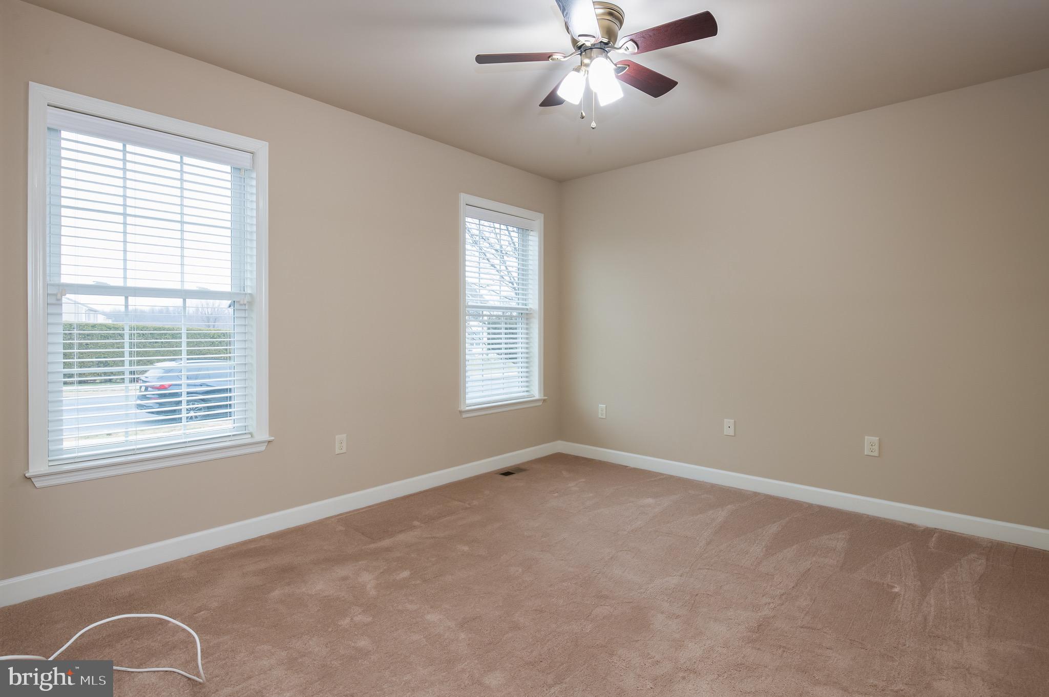 654 Ebersole Road Reading, PA 19605 - Photo 5 of 27 a view of an empty room with a window