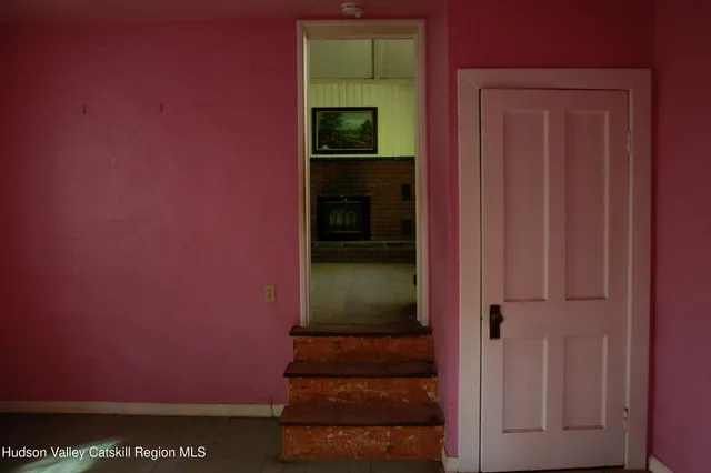 a room with furniture and window