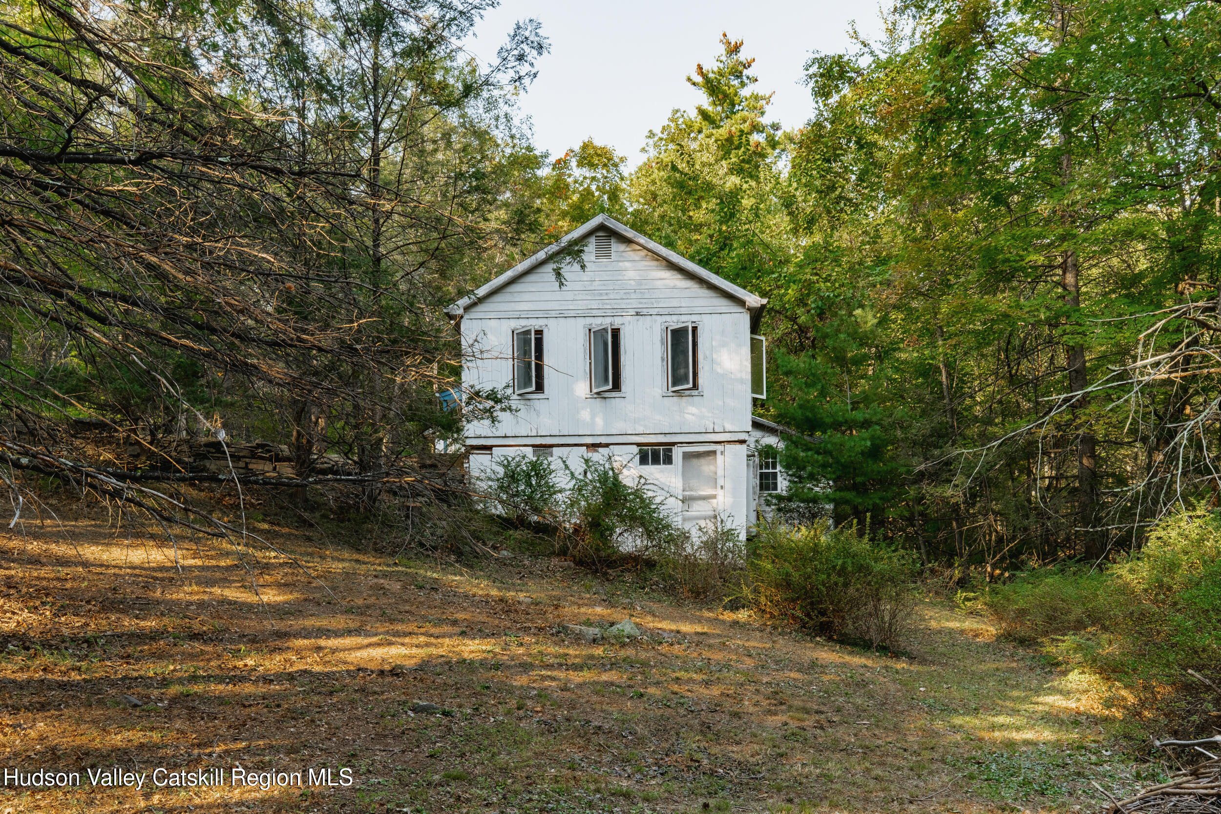 76 Meads Mountain Road Woodstock, NY 12498 - Photo 5 of 28 a view of a house with a yard