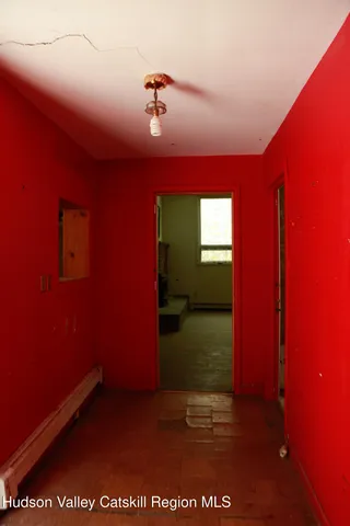 a view of empty room with a window