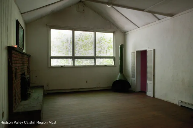 a room with window and closet
