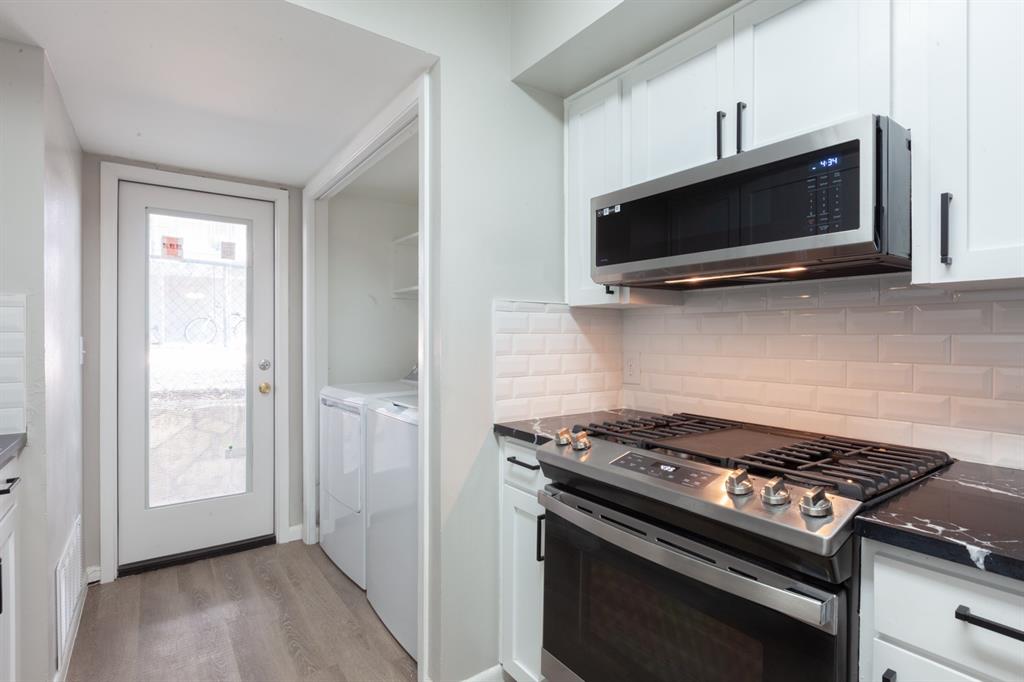 3407 Grooms Street Austin, TX 78705 - Photo 2 of 10 a kitchen with a stove and a microwave