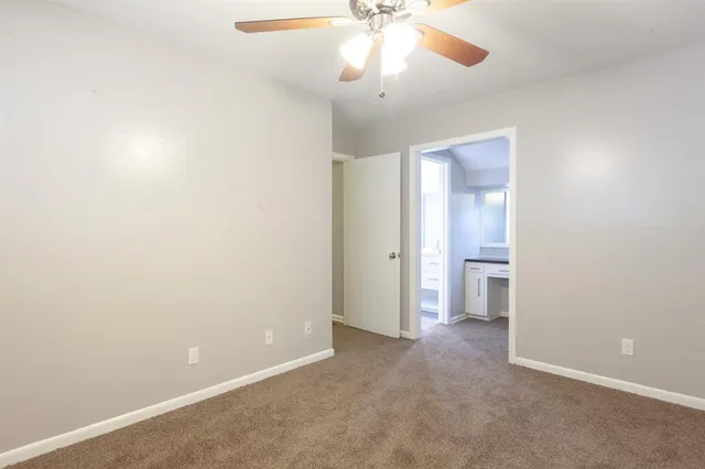 an empty room with a bathroom