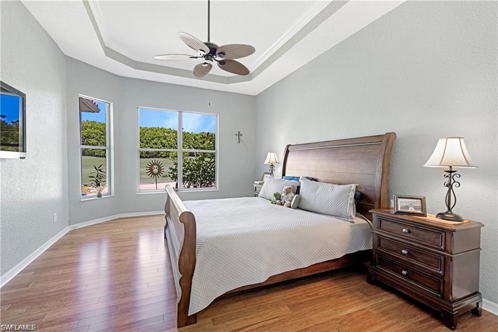 349 Harvard Lane Naples, FL 34104 - Photo 11 of 31 a bedroom with a bed and window