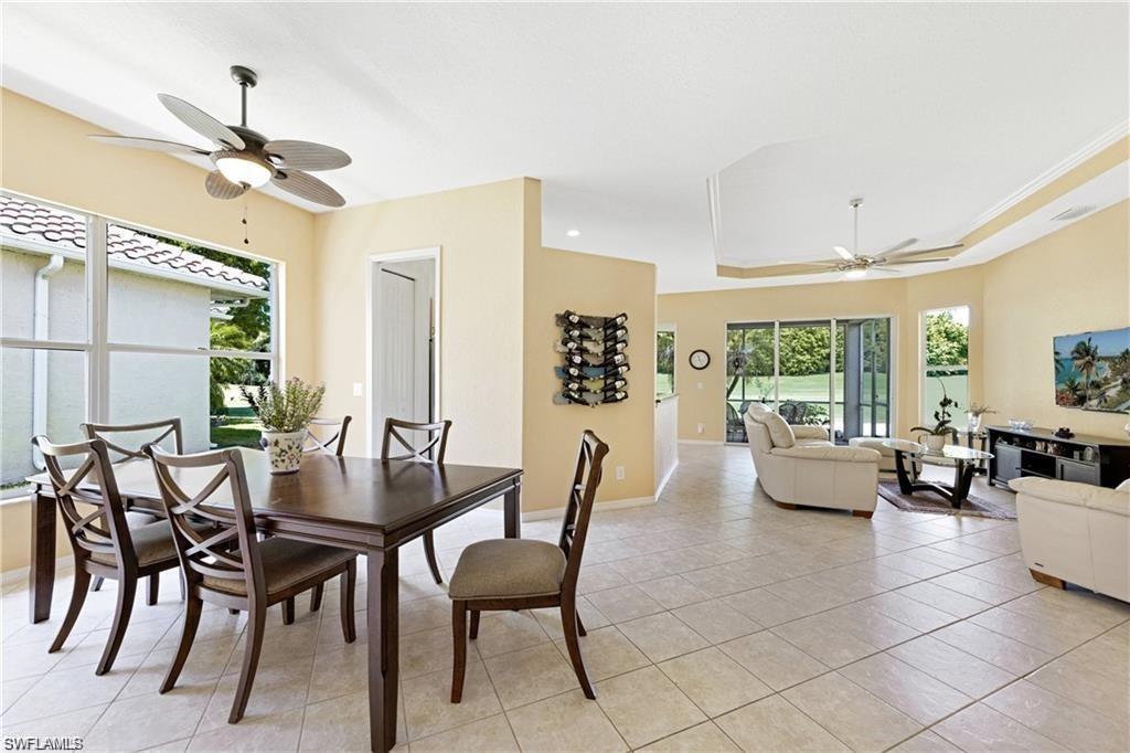 349 Harvard Lane Naples, FL 34104 - Photo 5 of 31 a view of a livingroom and dining room