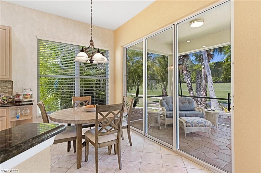 349 Harvard Lane Naples, FL 34104 - Photo 10 of 31 a view of a dining room and livingroom
