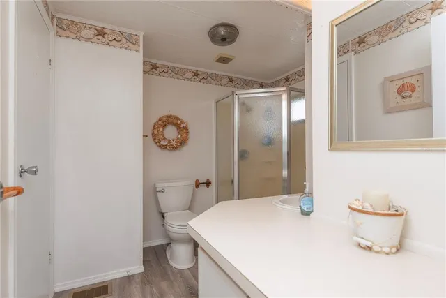 a view of a house with backyard and garden