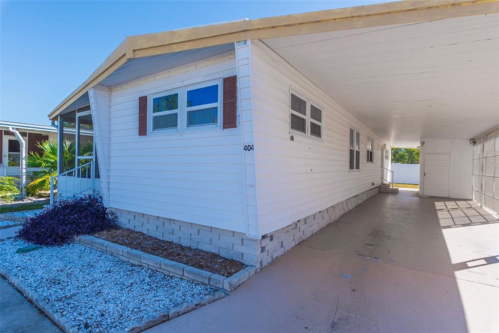 3301 Alt 19, Unit 404 Dunedin, FL 34698 - Photo 17 of 67 a view of a house with porch
