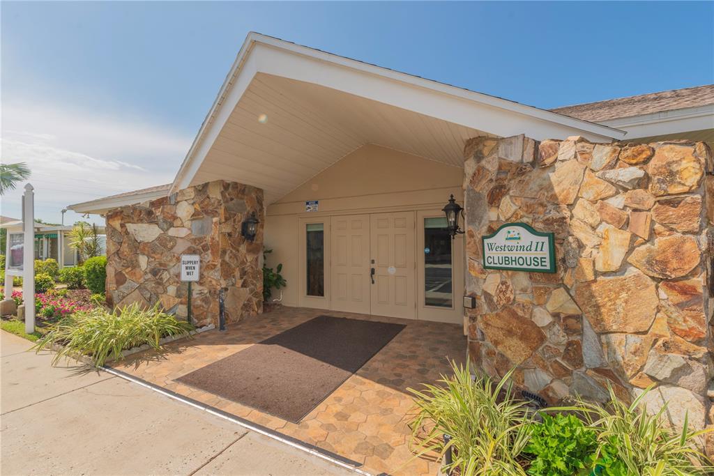 3301 Alt 19, Unit 404 Dunedin, FL 34698 - Photo 22 of 67 a front view of a house