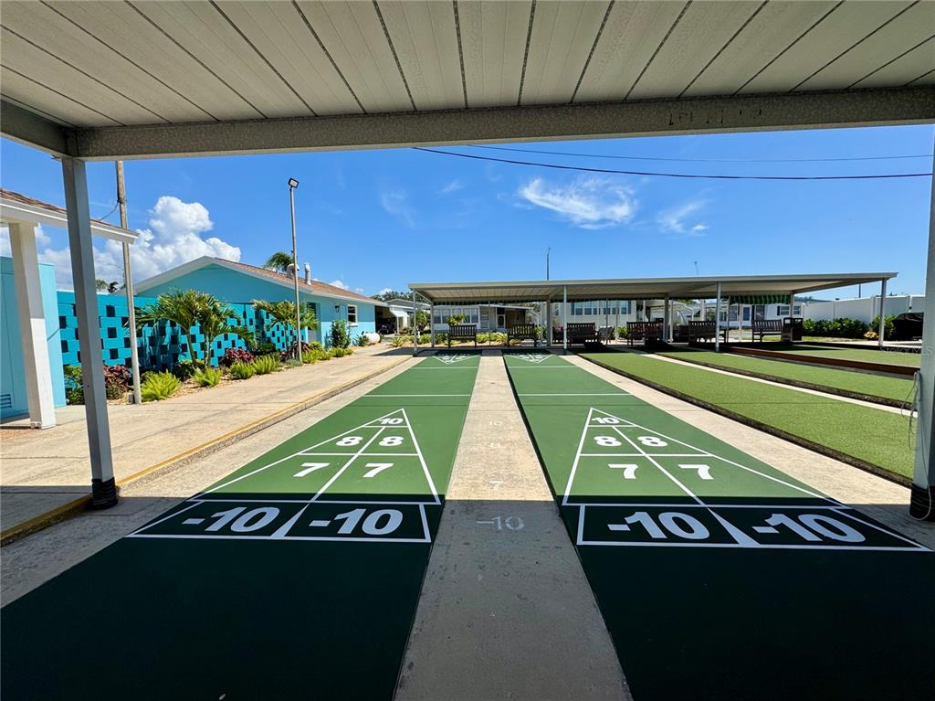 3301 Alt 19, Unit 404 Dunedin, FL 34698 - Photo 34 of 67 a view of a pool table and chairs in the room