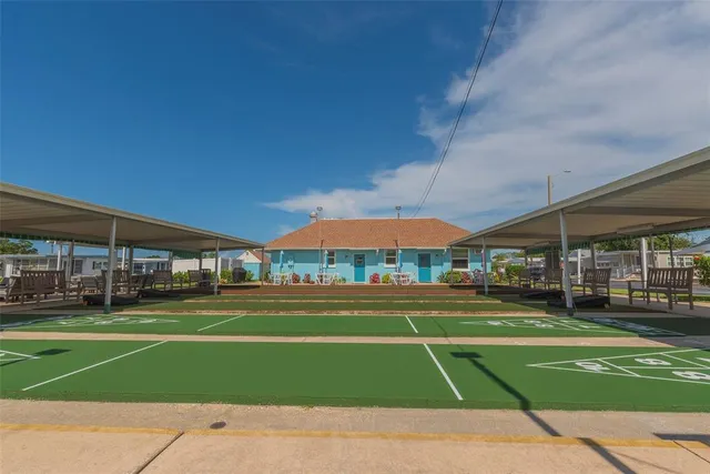 a view of a backyard with a patio
