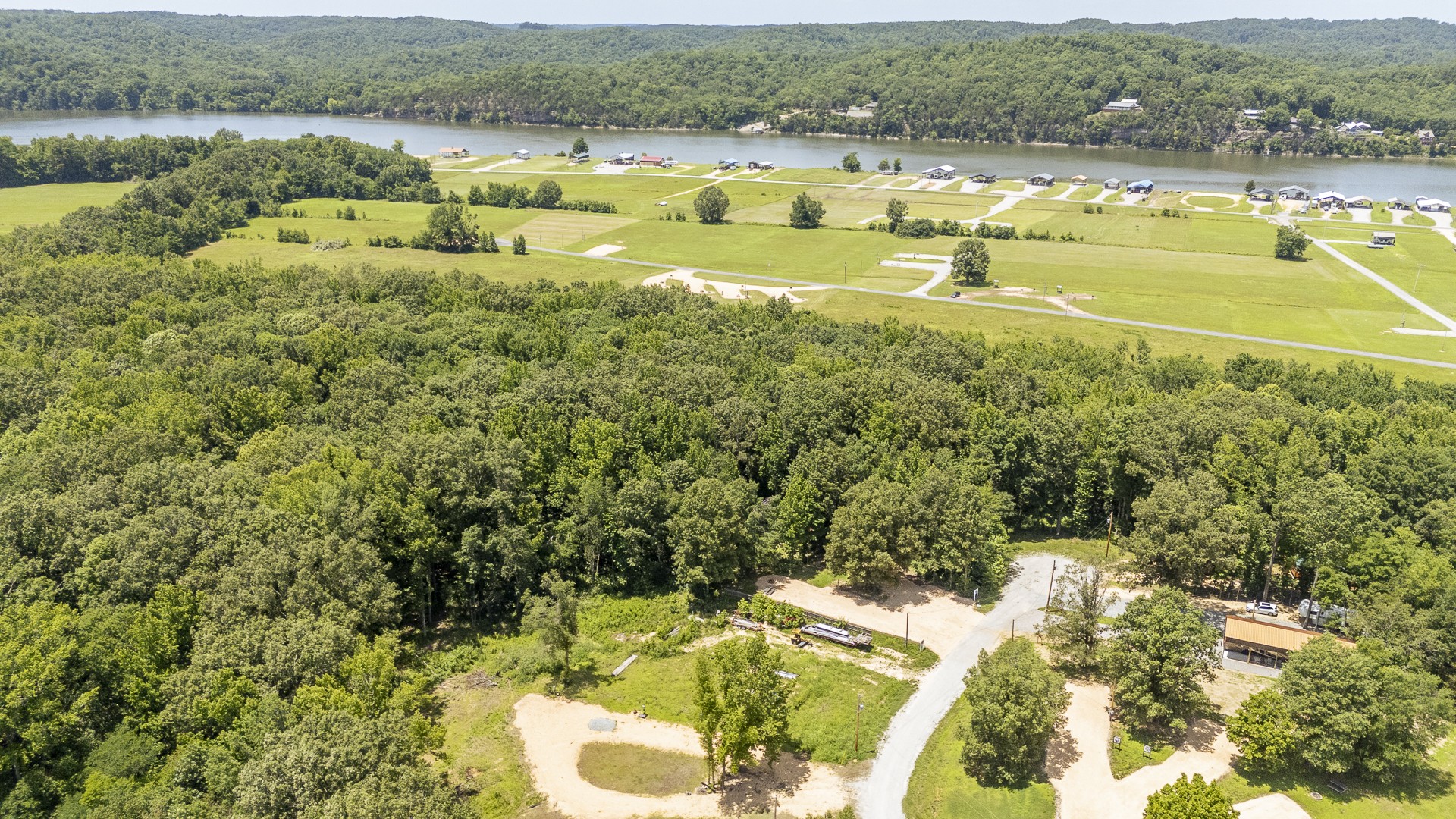 264 Duck Blind Road Clifton, TN 38425 - Photo 9 of 14 a view of a lake with a mountain