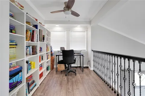 a view of a workspace with furniture and toys