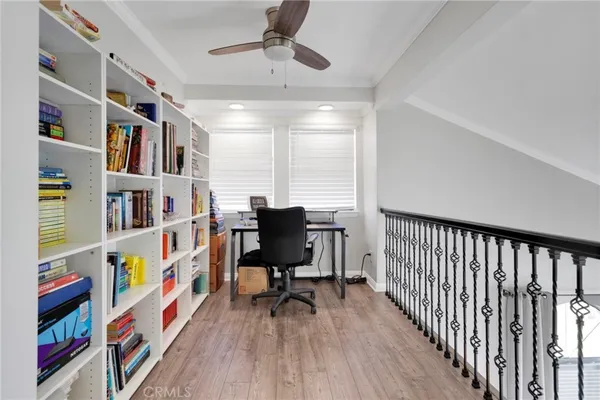a view of a workspace with furniture and toys