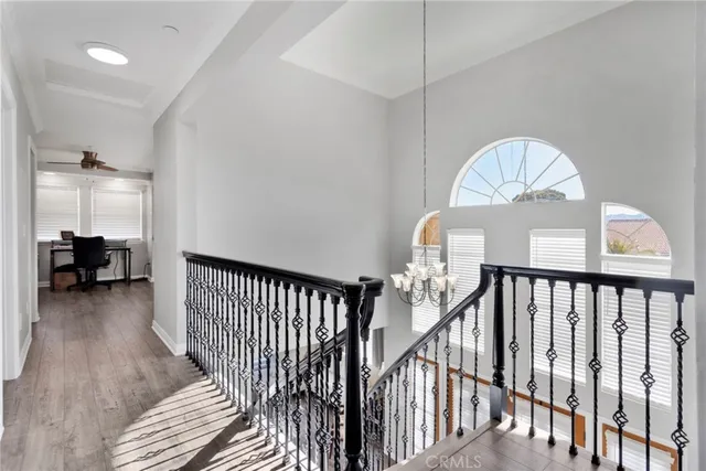 a view of a livingroom with furniture and staircase