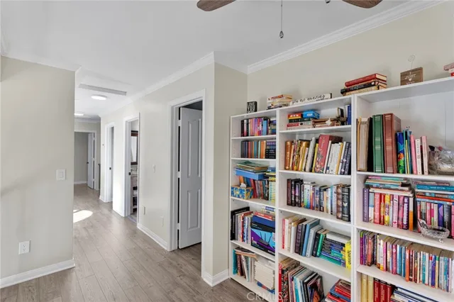 a view of room with furniture and wooden floor