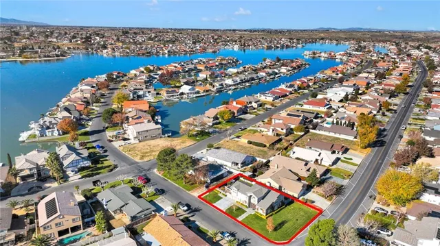 an aerial view of a residential houses and outdoor space