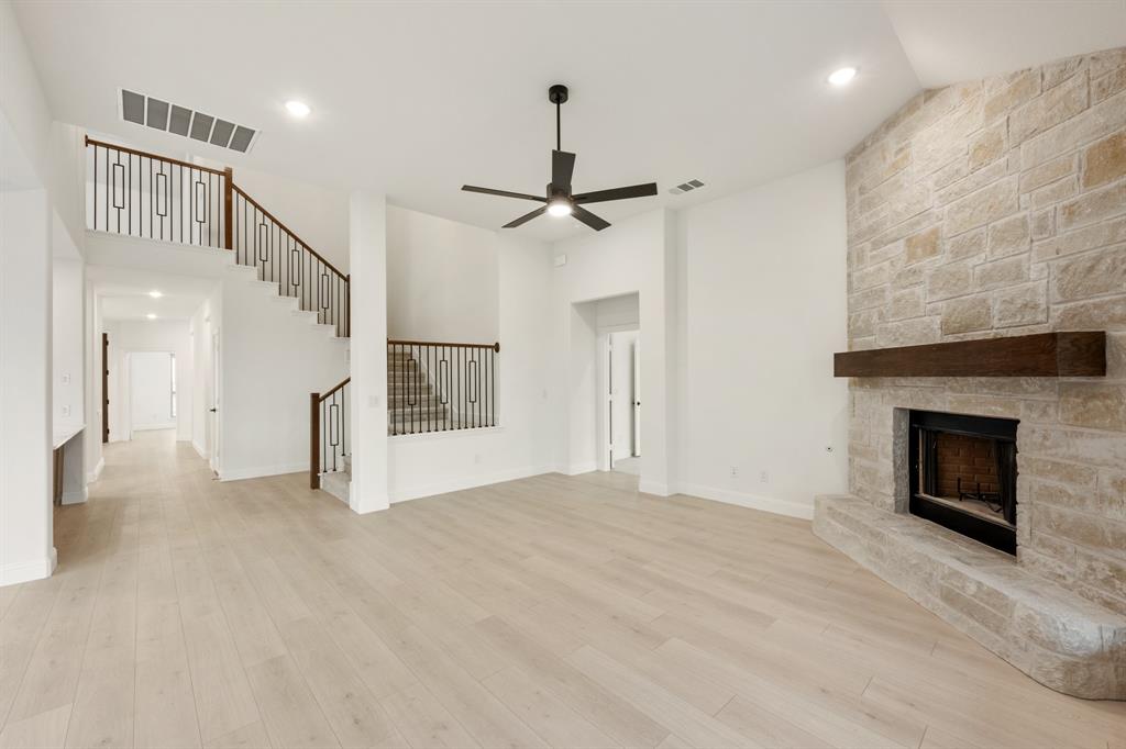 2813 Spg Vly Way Anna, TX 75409 - Photo 18 of 40 a view of an empty room with a fireplace