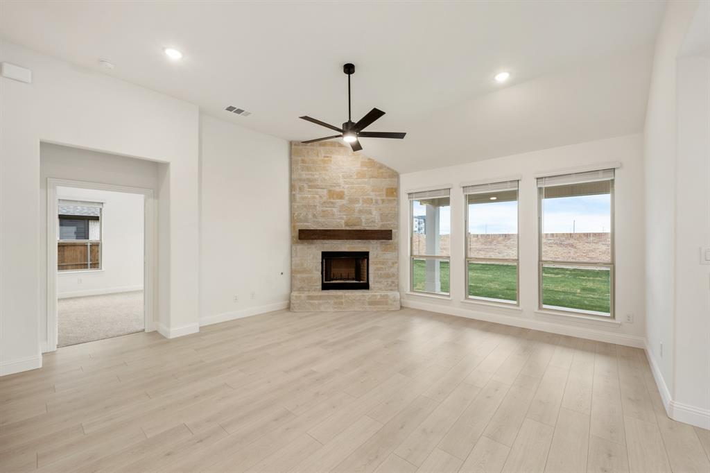 2813 Spg Vly Way Anna, TX 75409 - Photo 20 of 40 a view of livingroom with furniture wooden floor and window