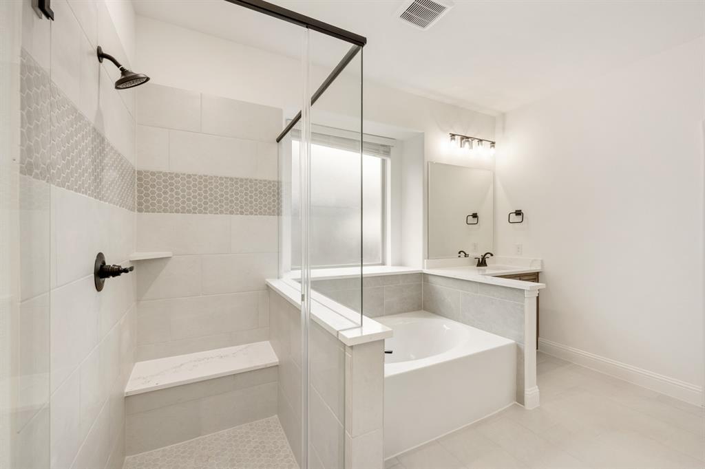 2813 Spg Vly Way Anna, TX 75409 - Photo 24 of 40 a bathroom with a tub and a shower