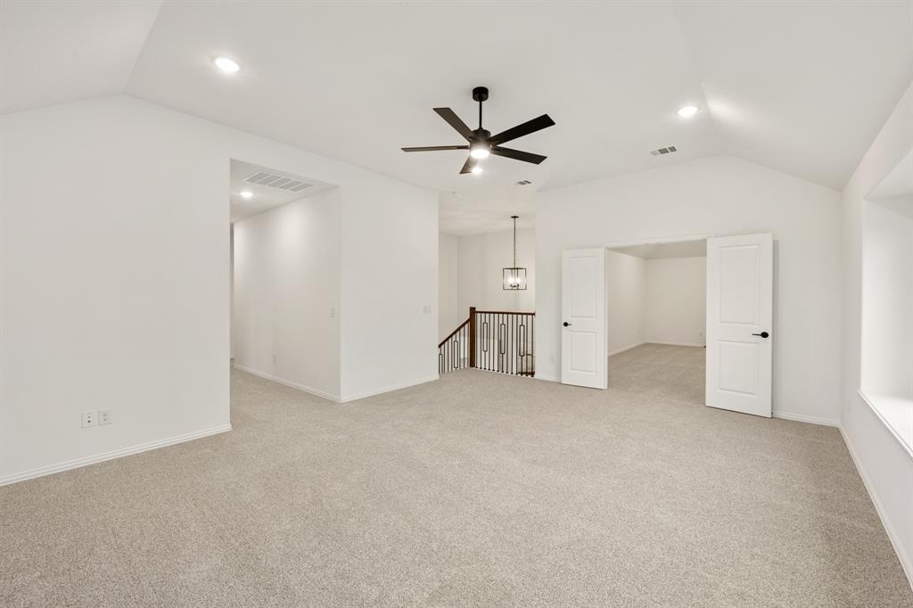 2813 Spg Vly Way Anna, TX 75409 - Photo 29 of 40 an empty room with a ceiling fan and a window