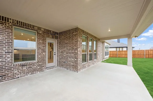 a view of an empty room with a balcony