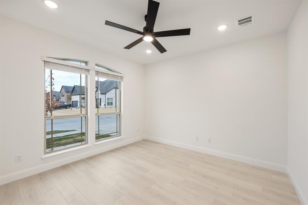 2813 Spg Vly Way Anna, TX 75409 - Photo 9 of 40 a view of room with a ceiling fan and window