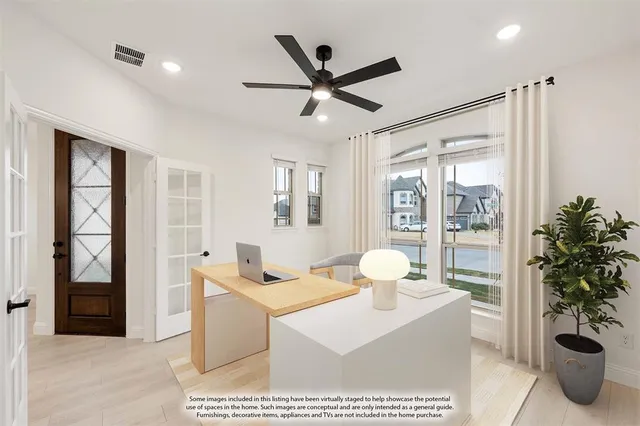 a workspace with furniture and window