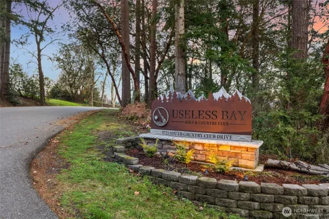 a sign on the side of the road