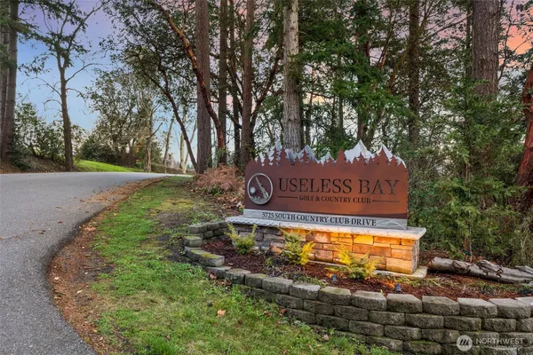 a sign on the side of the road