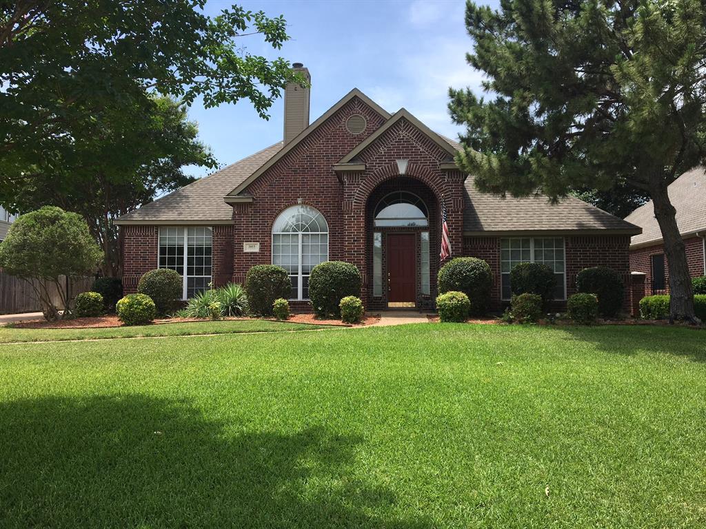 2613 Flameleaf Drive Grapevine, TX 76051 - Photo 1 of 1 a front view of a house with garden and porch