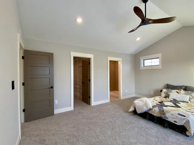 a view of a room with racks on the wall