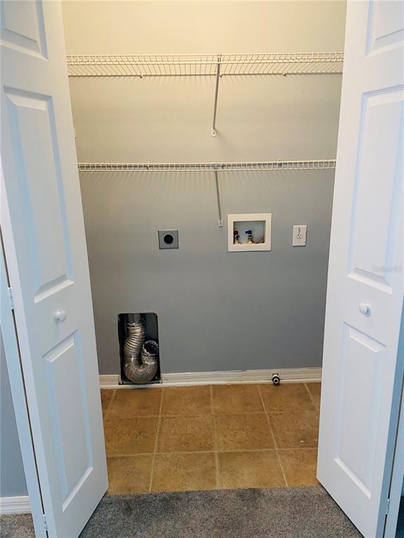 11658 Mango Ridge Boulevard Seffner, FL 33584 - Photo 18 of 20 a view of utility room