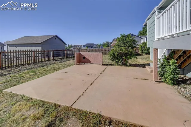 a view of a house with a street