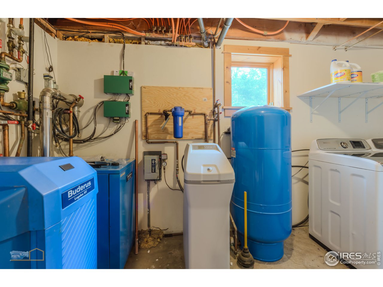 3301 Ridge Road Nederland, CO 80466 - Photo 39 of 40 a utility room with dryer and washer