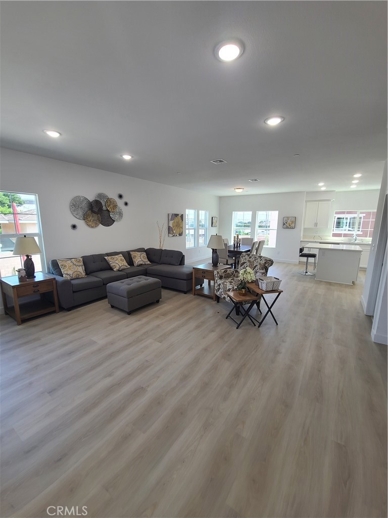 12766 Torch Street, Unit B Baldwin Park, CA 91706 - Photo 12 of 13 a living room with furniture