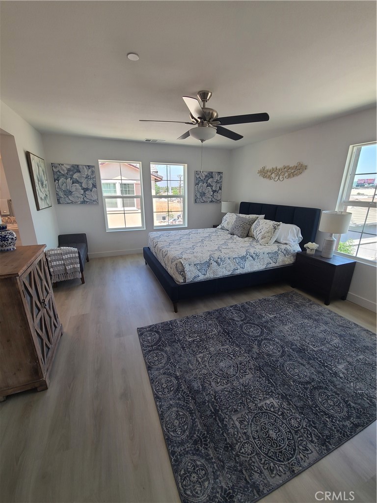 12766 Torch Street, Unit B Baldwin Park, CA 91706 - Photo 13 of 13 a living room with furniture and a large window