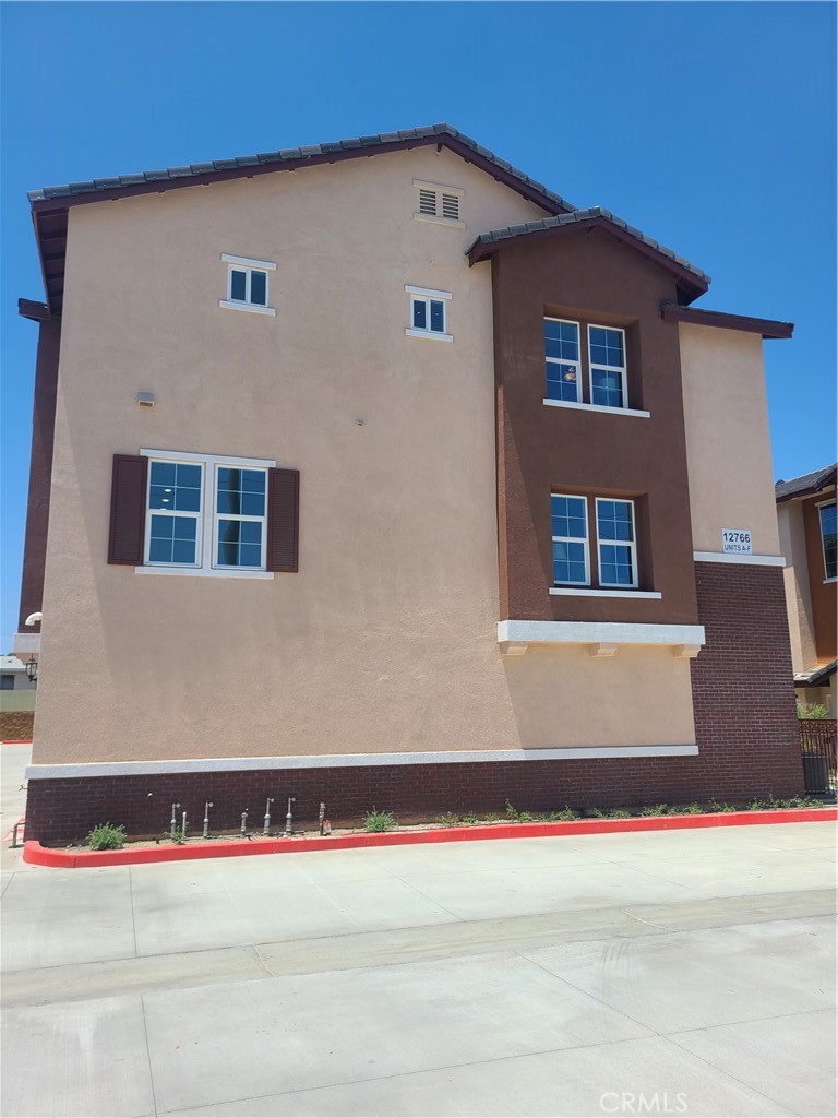 12766 Torch Street, Unit B Baldwin Park, CA 91706 - Photo 4 of 13 a front view of a house