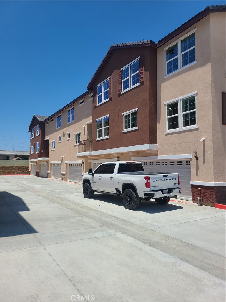 12766 Torch Street, Unit B Baldwin Park, CA 91706 - Photo 5 of 13 a car parked in front of a building