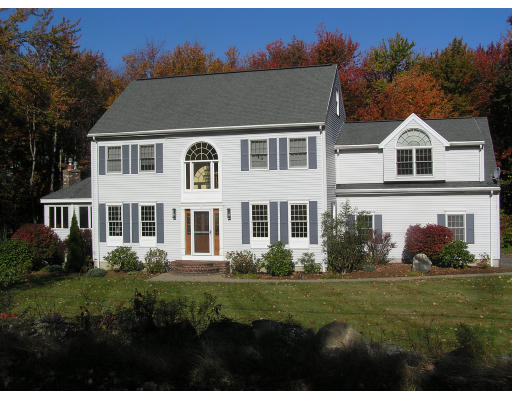 18 Hunt Road Westford, MA 01886 - Photo 1 of 1 a front view of a house with a yard