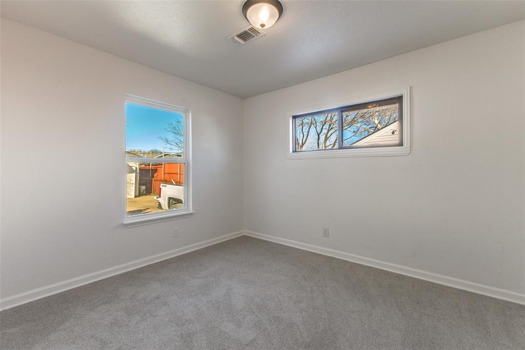 3719 Dutton Drive Dallas, TX 75211 - Photo 15 of 24 an empty room with window